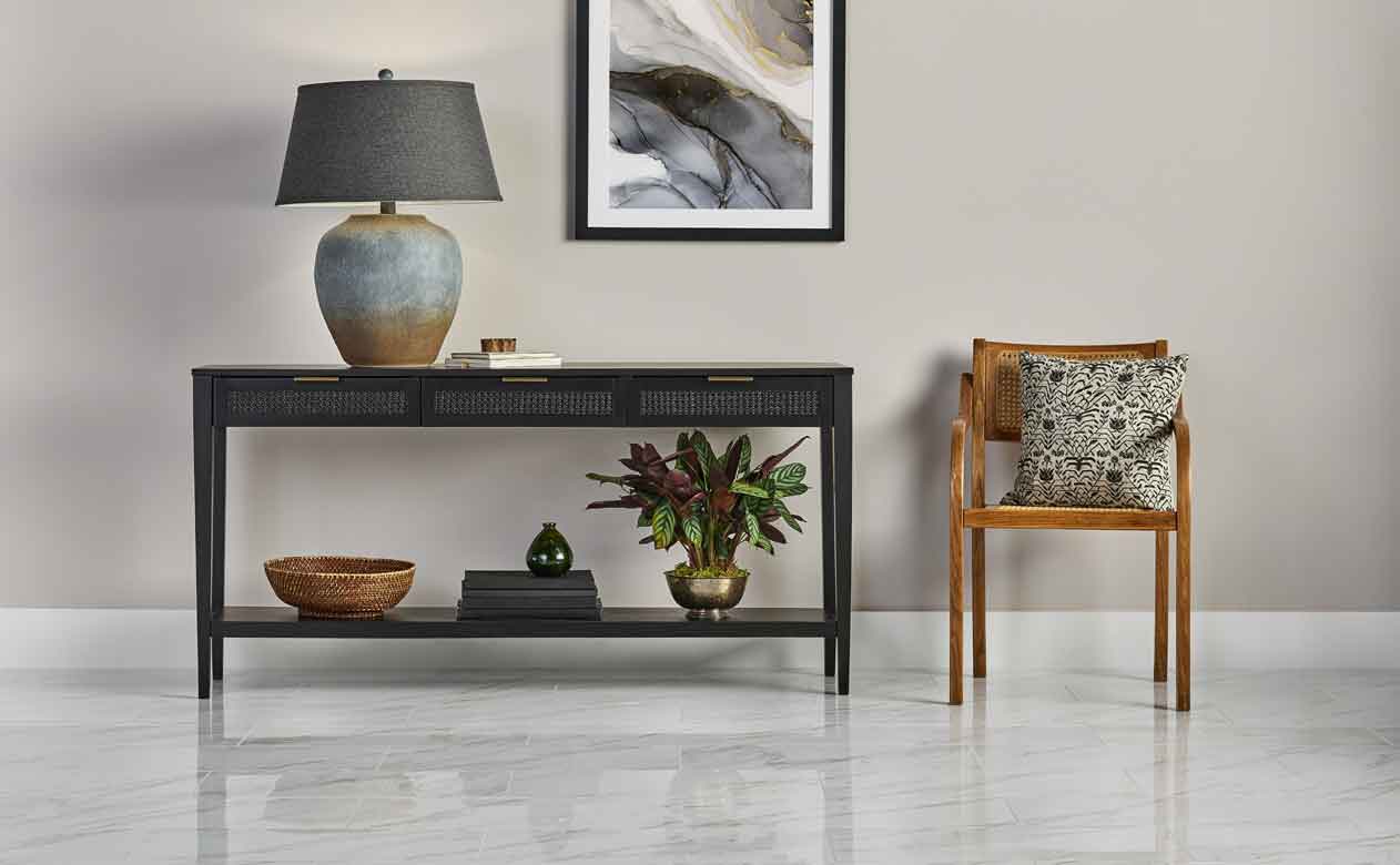 modern entryway with glossy marble floors and entryway table and chair